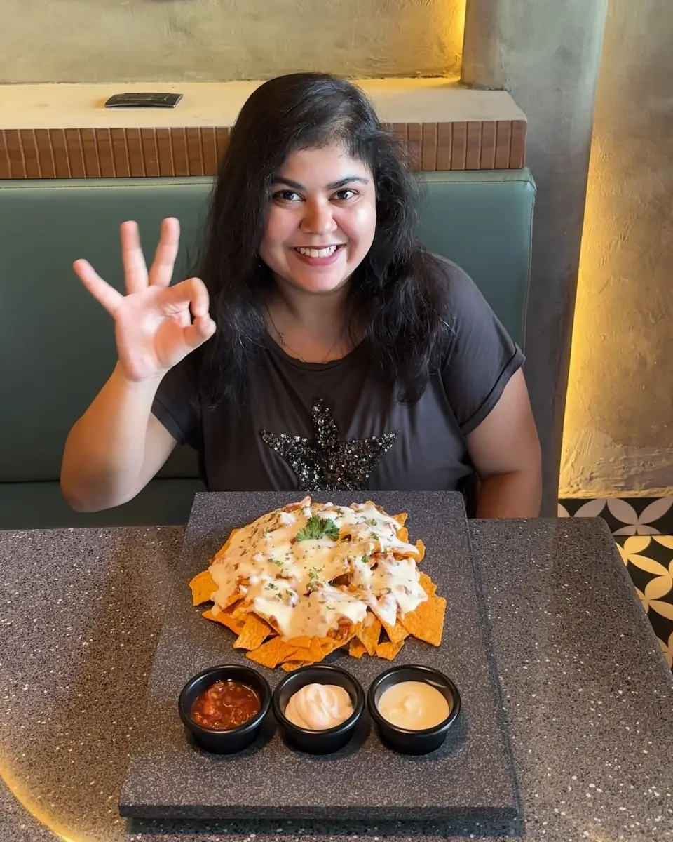 Guest sharing loaded nachos